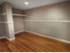 Cozy basement with finished floors, shelving, and neutral paint colors at 9236 W Euclid Ave, Littleton, CO 80123