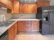 Spacious kitchen equipped with oak cabinets and updated countertops at 9236 W Euclid Ave, Littleton, CO 80123