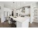 Modern kitchen featuring stainless steel appliances and a large island at 2434 Marshall Ct, Erie, CO 80516