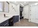 Organized mudroom with built-in bench, cubbies, and desk at 2434 Marshall Ct, Erie, CO 80516