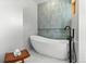 Spa-like bathroom with a freestanding tub and modern finishes at 350 Holly St, Denver, CO 80220