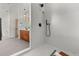 Modern bathroom features a walk-in shower and dual vanity with stylish design at 350 Holly St, Denver, CO 80220