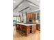 Well-appointed kitchen with island, modern appliances and sleek pendant lighting at 350 Holly St, Denver, CO 80220