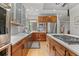 Spacious kitchen features an island with cooktop, plenty of counter space and stainless steel appliances at 350 Holly St, Denver, CO 80220