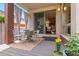 Charming patio with outdoor dining set, wooden deck and sliding door access at 350 Holly St, Denver, CO 80220