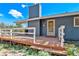 Exterior view of home featuring a welcoming front deck and well-maintained facade at 779 Aspen Way, Evergreen, CO 80439