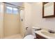 Full bathroom showcases tiled shower stall and a classic vanity with storage at 3270 S Krameria St, Denver, CO 80222