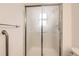 Bathroom shower features a sliding glass door and accessible handrails and towel rack at 3270 S Krameria St, Denver, CO 80222