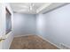 Spacious bedroom with light blue walls and carpeted floor at 1124 W 124Th Ct, Denver, CO 80234