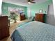 Bright, traditional bedroom with a window, furniture, and a ceiling fan at 12622 W Radcliff Ave, Morrison, CO 80465
