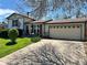 A well kept single Gathering home with tidy landscaping and a two car garage at 12622 W Radcliff Ave, Morrison, CO 80465