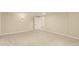 Finished basement with neutral carpet, freshly painted walls and storage at 7778 S Cherry Ct, Centennial, CO 80122