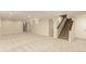 Spacious basement with neutral carpet, recessed lighting, and stairway to upper level at 7778 S Cherry Ct, Centennial, CO 80122
