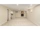 Finished basement with a fireplace, neutral carpet and freshly painted walls at 7778 S Cherry Ct, Centennial, CO 80122