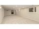 Finished basement with a fireplace, neutral carpet and window at 7778 S Cherry Ct, Centennial, CO 80122