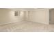 Finished basement featuring neutral carpet, window and freshly painted walls at 7778 S Cherry Ct, Centennial, CO 80122