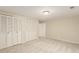 Finished basement with neutral carpet, recessed lighting, freshly painted walls and storage at 7778 S Cherry Ct, Centennial, CO 80122