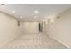 Bright basement featuring neutral carpet and recessed lights with a window at 7778 S Cherry Ct, Centennial, CO 80122