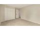 Empty bedroom with closet, carpet and neutral paint at 7778 S Cherry Ct, Centennial, CO 80122