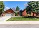Charming single-Gathering home with a well-manicured lawn and mature landscaping at 7778 S Cherry Ct, Centennial, CO 80122