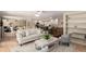 Open-concept living space with a cozy seating area and access to the kitchen at 7778 S Cherry Ct, Centennial, CO 80122