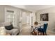 Functional home office showcasing a desk, and comfortable seating area at 7778 S Cherry Ct, Centennial, CO 80122