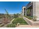 Private backyard features an artificial lawn and patio with landscaping to provide a personal outdoor space at 10119 Bellwether Ln, Lone Tree, CO 80124