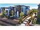 Stunning home featuring multiple balconies, a landscaped yard, and a modern design at 10119 Bellwether Ln, Lone Tree, CO 80124