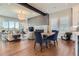Open-concept living room with hardwood floors, modern fireplace and comfortable seating at 10119 Bellwether Ln, Lone Tree, CO 80124