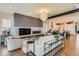 Open-concept living space with stylish furniture, hardwood floors, and an open kitchen at 10119 Bellwether Ln, Lone Tree, CO 80124