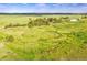 Aerial view of home on farm and pastures with trails and beautiful views at 1353 S Elbert St, Elizabeth, CO 80107