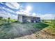 Outdoor view of barn with a large side awning on a farm property at 1353 S Elbert St, Elizabeth, CO 80107
