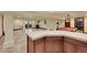 Basement featuring a wet bar, pool table, and laundry at 1353 S Elbert St, Elizabeth, CO 80107