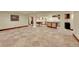 Finished basement with a pool table and wet bar at 1353 S Elbert St, Elizabeth, CO 80107
