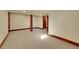 Basement features neutral carpet and trim at 1353 S Elbert St, Elizabeth, CO 80107