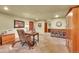 Home office with desk, computer, and plenty of storage at 1353 S Elbert St, Elizabeth, CO 80107