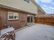 Private back patio with fenced yard, perfect for outdoor relaxation or entertaining at 3957 S Boston St, Denver, CO 80237