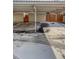 Exterior view of covered parking during winter at 3957 S Boston St, Denver, CO 80237