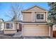 Charming two-story home with a two-car garage, brick accents, and a well-maintained front yard at 2488 W 111Th Pl, Denver, CO 80234