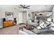 Open concept living room with modern furnishings and plenty of natural light, great for entertaining guests at 2488 W 111Th Pl, Denver, CO 80234