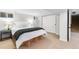 Bright bedroom with ample natural light, featuring a comfortable bed and closet at 1445 Ash St, Denver, CO 80220