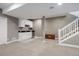 Basement with stylish mini bar and stairs leading to the upper floors, providing a cozy, functional living space at 3336 Goodyear St, Castle Rock, CO 80109
