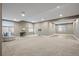 Expansive basement with large windows, neutral carpet, and recessed lighting, offering versatile living or recreational space at 3336 Goodyear St, Castle Rock, CO 80109