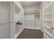 Walk-in closet offering ample storage space with custom shelving and rods at 3336 Goodyear St, Castle Rock, CO 80109