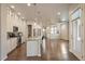 Modern kitchen boasts stainless appliances, granite counters, and ample storage space at 3336 Goodyear St, Castle Rock, CO 80109