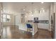Modern kitchen with granite countertops, stainless steel appliances, and a breakfast bar at 3336 Goodyear St, Castle Rock, CO 80109