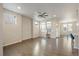 Bright and airy living room with hardwood floors, neutral walls, and an open floor plan at 3336 Goodyear St, Castle Rock, CO 80109