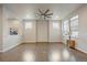 Bright living room with hardwood floors, large windows, and open-concept design at 3336 Goodyear St, Castle Rock, CO 80109