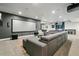 Spacious basement with a large projector screen, sectional sofa, and surround sound at 16244 Thunder Cat Way, Monument, CO 80132