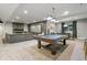 Entertainment basement with a pool table, media area, and comfortable seating at 16244 Thunder Cat Way, Monument, CO 80132